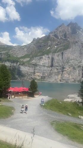 Lunch and lake views at Kandersteg's alpine waterfront