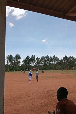 Soccer match played on dirt field in Lugari, Kenya