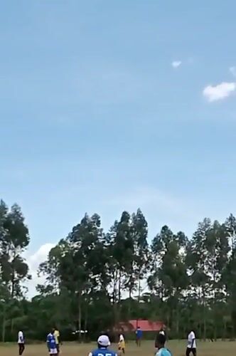 Soccer match played on dirt field in Lugari, Kenya