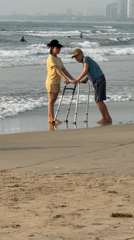 Fishermen process fresh catch including jellyfish on Đà Nẵng beach