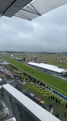 Horse racing event draws crowds to Epsom Downs