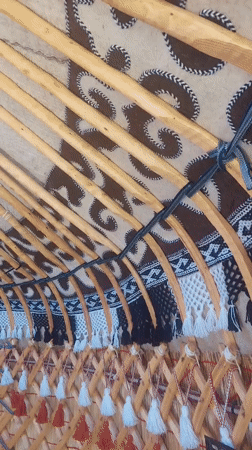 Inside a Kyrgyz yurt and the landscape around it