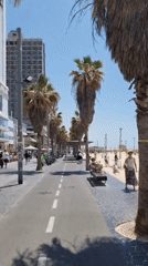 Tel Aviv beachgoers enjoy sunny Friday morning activities