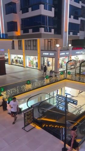 Alanya mall lit up on a July evening