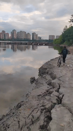 Urban exploration by a Russian waterway at sunset