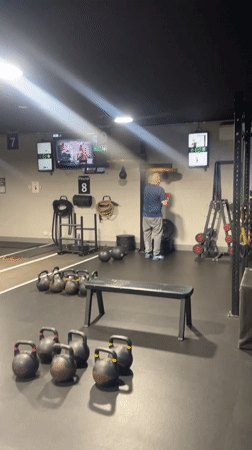 Inside a Melbourne boxing gym on a winter evening.