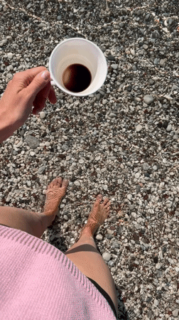 Coffee break in shallow waters at Montenegro beach