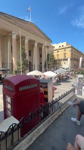 Tourists explore Valletta landmarks during busy afternoon sightseeing session
