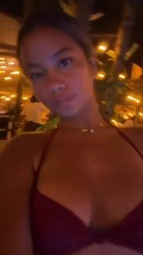 Evening poolside dining captured at Bali restaurant venue