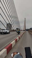 Morning traffic and harbor activity in Bai Chay Ward