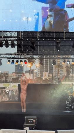 Two dancers perform live on stage in Tel Aviv