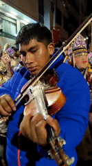 Religious procession with marching bands celebrates in Cusco streets