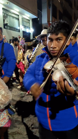 Religious procession with marching bands celebrates in Cusco streets