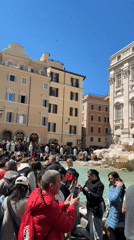 Routine morning activity documented around Rome's Trevi Fountain district