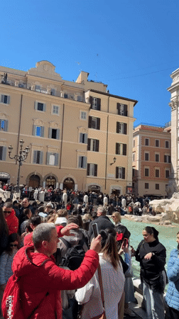 Routine morning activity documented around Rome's Trevi Fountain district