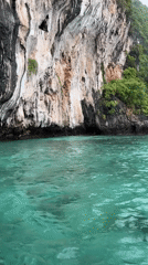 Limestone karsts and turquoise water at Haad Hin Khom