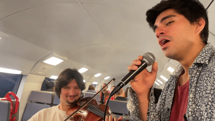 Musicians perform aboard train in Barcelona
