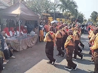 Scout parade and street gathering in Yosowilangun Kidul village