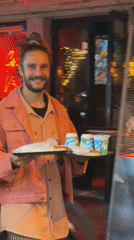 Turkish street vendor serves fresh fish wraps in Istanbul