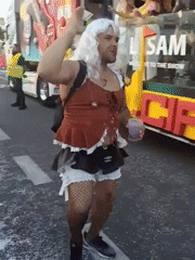 Carnival parade with costumed performers celebrates in Spanish resort towns