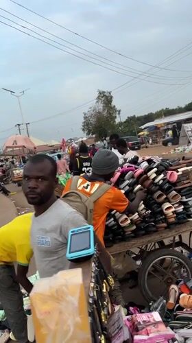 Ordinary marketplace and street activity documented in Bukuru, Nigeria