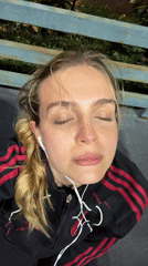 Woman in tracksuit observed lying in Tbilisi public space
