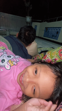 Afternoon playtime in Gelam with pink unicorn shirt