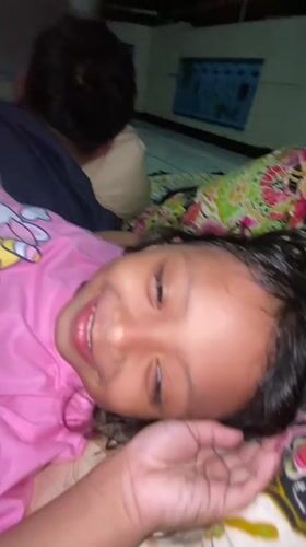 Afternoon playtime in Gelam with pink unicorn shirt