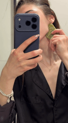 Woman records mirror selfie in Varna bathroom