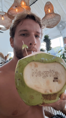 Late-night workout and coconut break captured in North Kuta