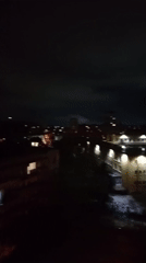 Nighttime cityscape captured from elevated vantage point