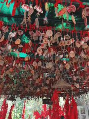 Decorative bell and ribbon ornaments documented in China