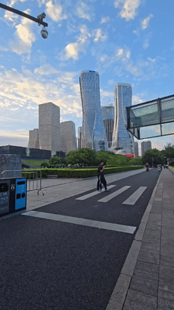 Urban life documented across Shangcheng District during golden hour