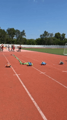Harness sled pulls on a red track in Angarsk