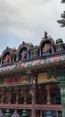 Batu Caves: golden statue, colorful stairs, and roaming macaques