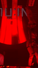 Costumed performer on stage at MU:IN Bali event