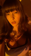 Young woman's evening selfie session with music in Ra'anana