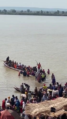 River transport activity observed near Lokoja with crowded passenger boats