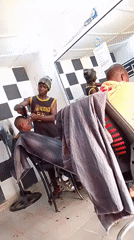 Barbershop scenes captured during busy afternoon period