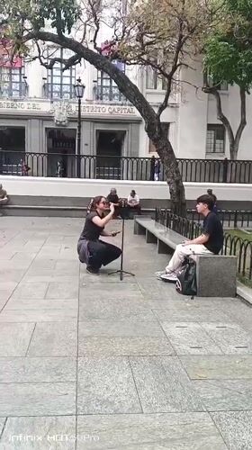 Everyday life captured around Caracas government district plazas