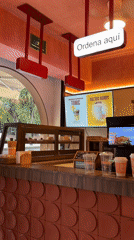 Mexico City coffee shop captured with Spanish ordering signage