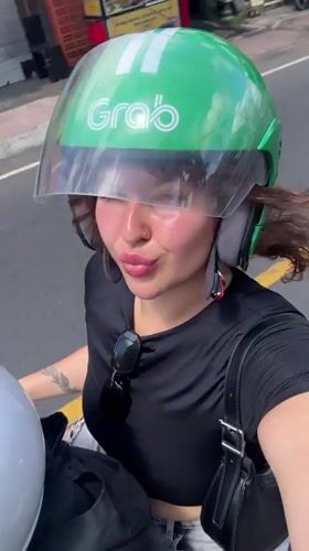 Woman spotted on motorcycle ride and outdoors in Ubud