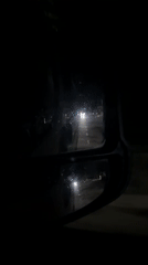 Nighttime drive through tree-lined streets in Izmail, Ukraine