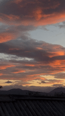 Dramatic sunset illuminates Ushuaia skyline with golden hues