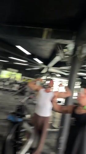 Two men take selfie video at Ratsada gym