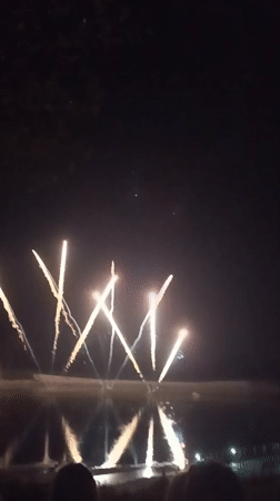 Fireworks light up the Po River at Boretto's summer evening gathering