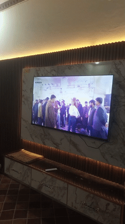 Wedding celebration broadcasts on TV in Pakistani home