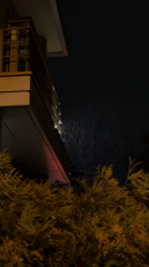 Rainy evening documented in Kazan building corner scene