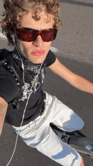 Young scooter rider spotted on Milan street