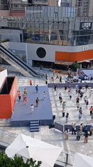 Public dance class draws crowds in Jiulongpo plaza